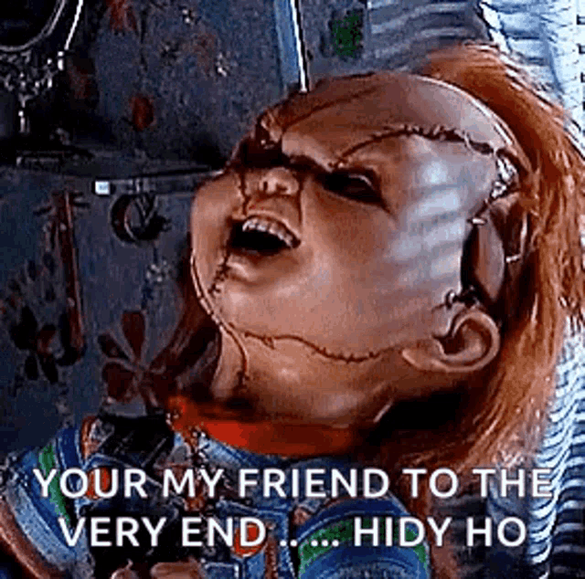 chucky from childs play is holding a knife in his hand and screaming .