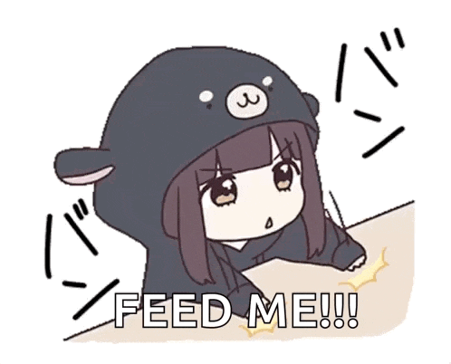 a cartoon girl wearing a black bear hoodie is standing next to a table and saying `` feed me ! ''