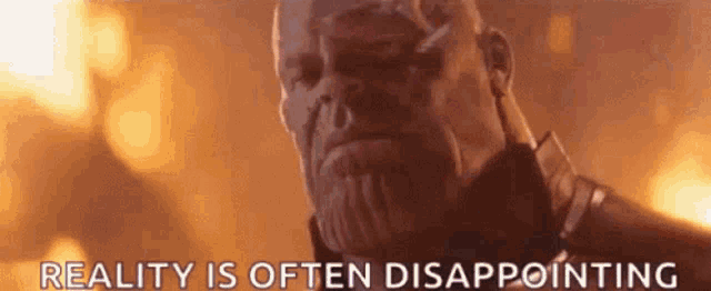 a man with a beard is standing in front of a fire and the words `` reality is often disappointing '' .