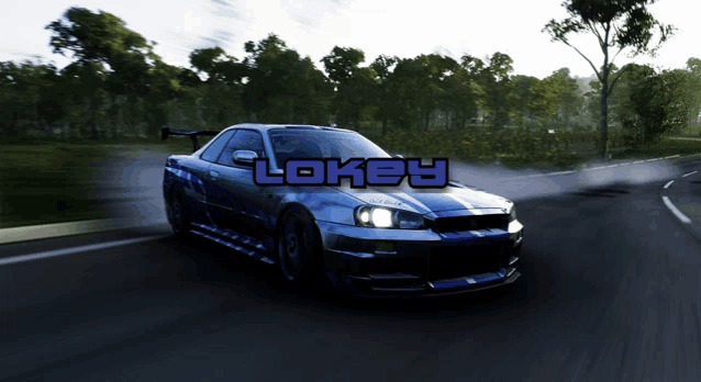 a blue car is driving down a road with the word lokey on the bottom