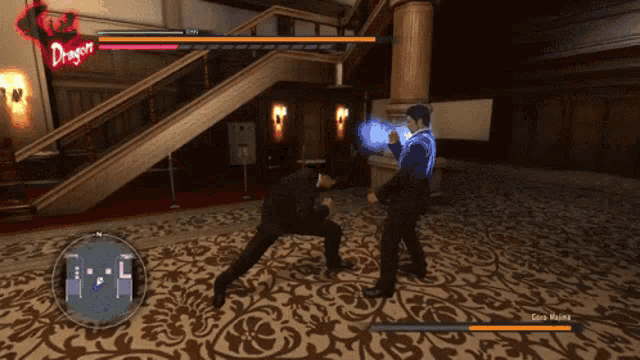 two men are fighting in a video game with the word dragon on the top