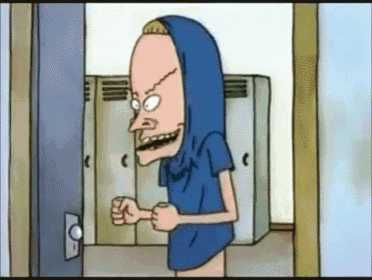 a cartoon character is standing in a locker room wearing a blue shirt and a hood .