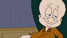 a cartoon character is sitting in a chair and making a face