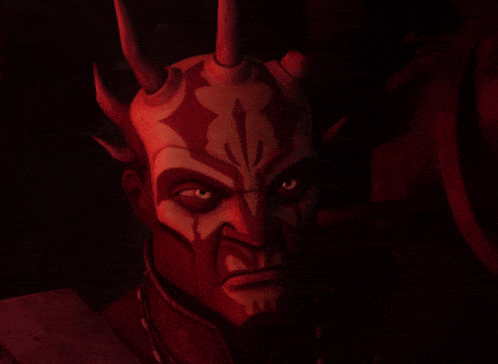 a close up of a cartoon character 's face with red paint on it