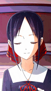 a girl with her eyes closed is wearing a shirt that says htma on it