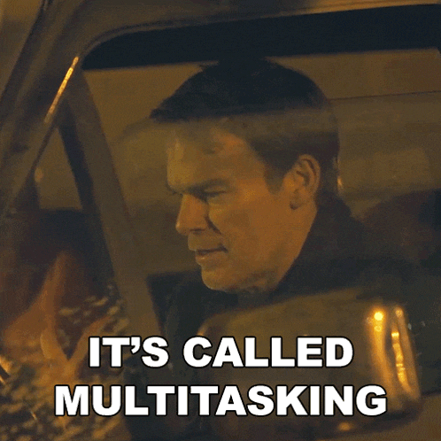 a man driving a car with the words it 's called multitasking