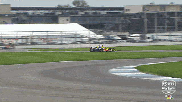 a nbc indycar race is being shown on a screen