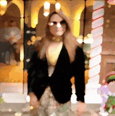 a blurry photo of a woman wearing sunglasses