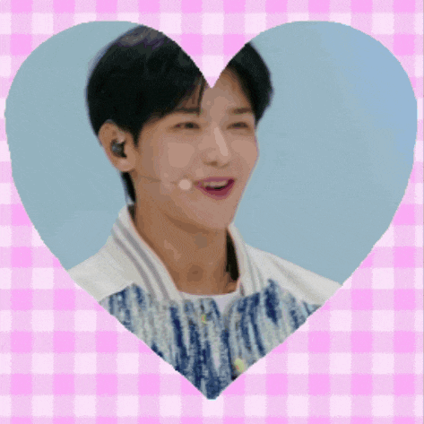 a picture of a man in a heart with a pink checkered background
