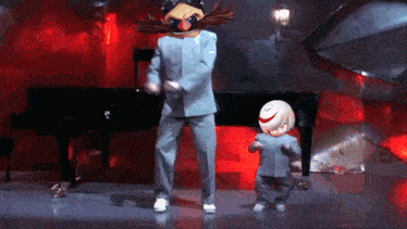 a man and a child are dancing in a room with a piano