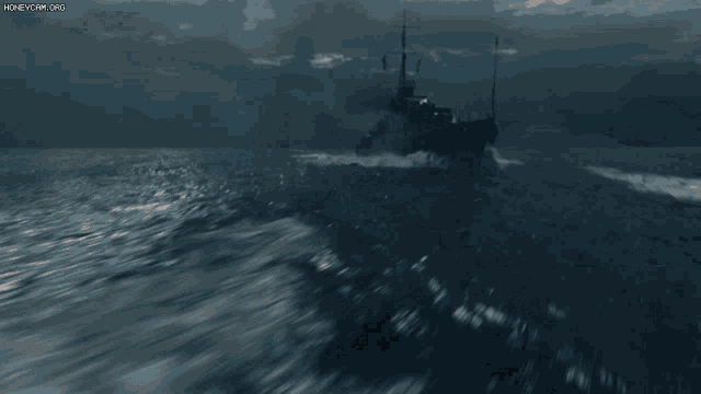 a boat is floating on the water and the website honeycam.org is visible in the corner