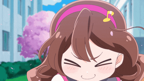 a girl with brown hair and a pink headband with a note on it