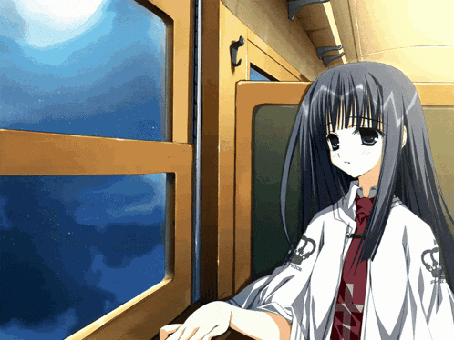 a girl in a white shirt with the letter d on the sleeve is looking out of a window