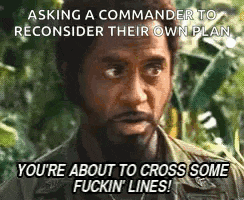 a man in a military uniform is talking to a commander .