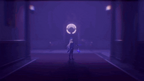 a purple light is shining on a person 's head