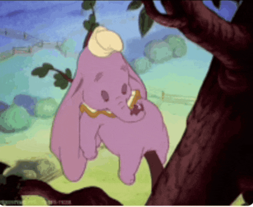 a cartoon of dumbo hanging on a tree branch