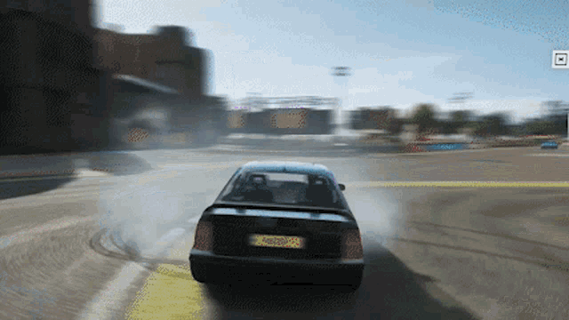 a black car with a license plate that says ' aa ' on it