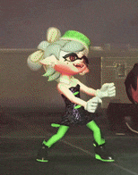 a cartoon character with green tights and a green hat is dancing