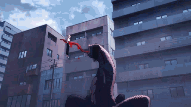 a man is being attacked by a monster in a city