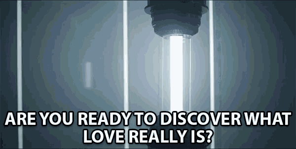 a light bulb with the words " are you ready to discover what love really is "