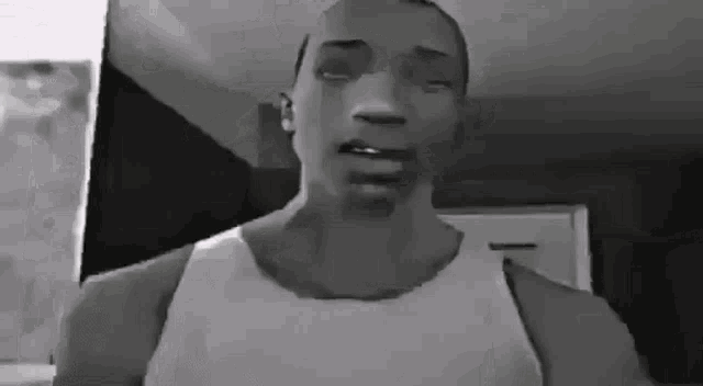 a black and white drawing of a man in a white tank top .