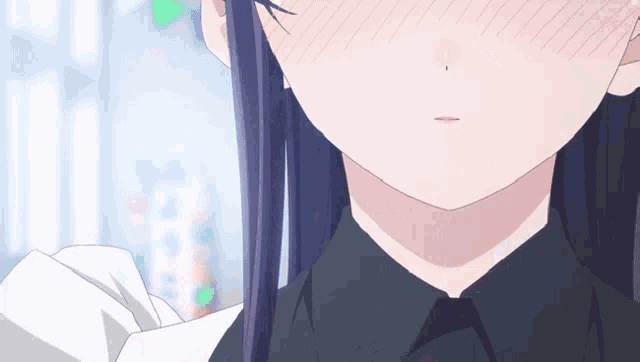a close up of a girl 's face with a white shirt on