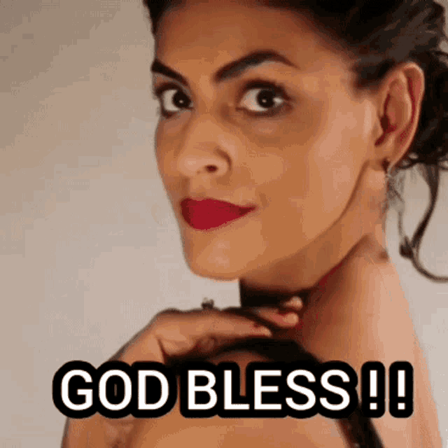 a close up of a woman 's face with the words `` god bless ! ''