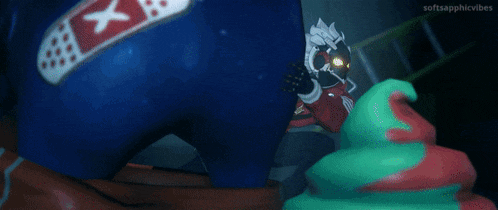 a cartoon character is standing next to a pile of green and red foam .