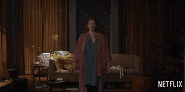 a netflix ad shows a woman in a living room
