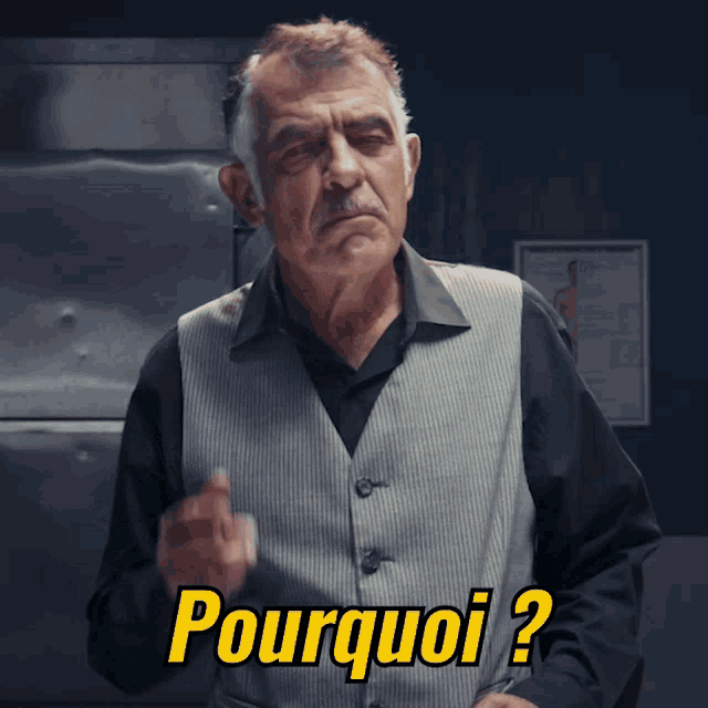 a man in a vest says pourquoi in yellow