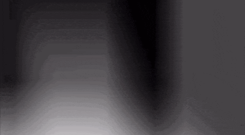 a black background with a white border and a shadow of a person .