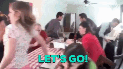 a group of people are sitting around a table with the words let 's go written on the bottom
