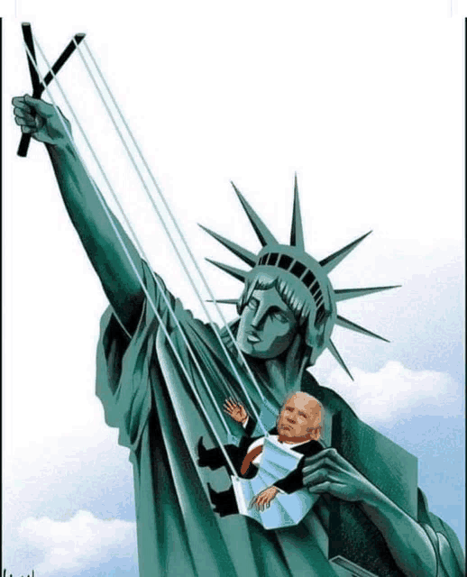 a statue of liberty is being manipulated by a man