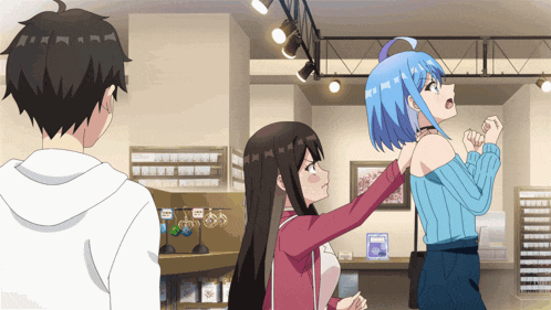 a man and two girls in a store with a sign that says ' a ' on it