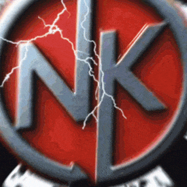 a nk logo with lightning bolts coming out of it