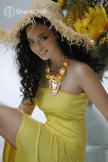 a woman wearing a straw hat and a yellow dress has a sharechat logo on the bottom