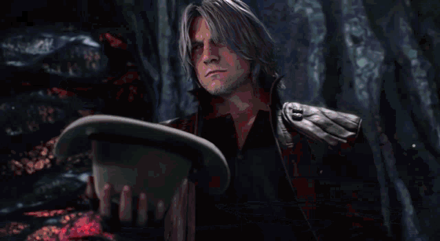 a man wearing a cowboy hat and gloves is surrounded by blood