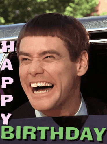 a man is laughing in a car with the words happy birthday below him