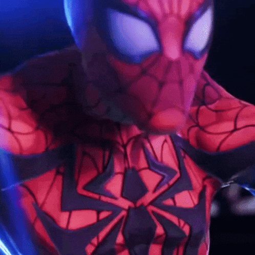 a close up of a spiderman costume with a blue background