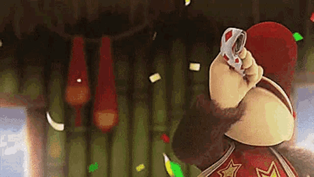 a cartoon monkey is holding a can of soda in his hand while confetti is falling around him .