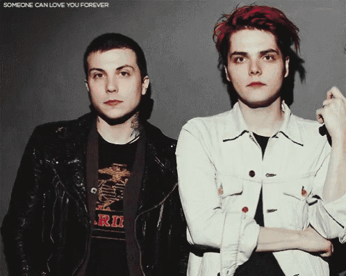 two men are standing next to each other with the words someone can love you forever above them