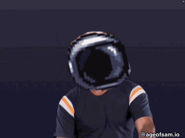 a man wearing a helmet giving the middle finger