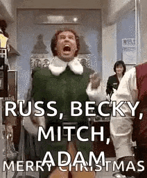 a man dressed as an elf from the movie elf is screaming in a room .