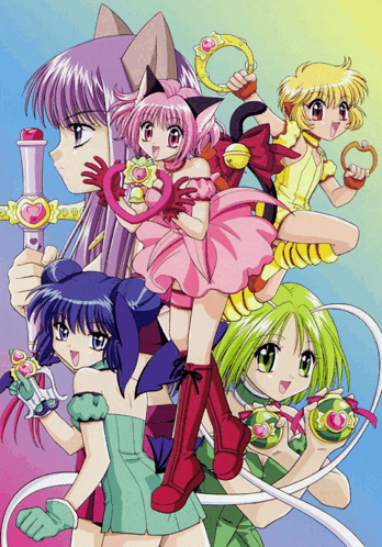 a group of anime girls are posing for a picture and one of them is holding a sword