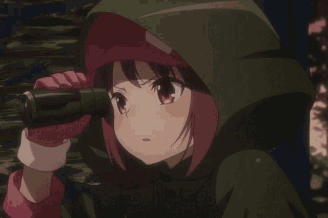 a girl in a green hooded jacket looks through binoculars