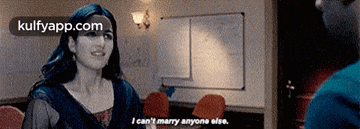 a woman is talking to a man in a meeting room and says i can 't marry anyone else .