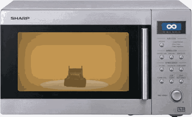 a silver sharp microwave oven with an infinity sign on the front