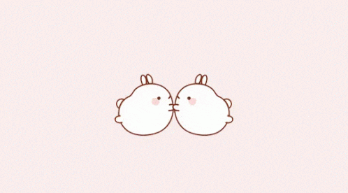 two cartoon rabbits are kissing each other on a pink background .