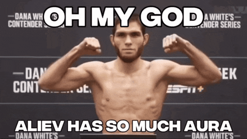a man is flexing his muscles in front of a sign that says " oh my god "