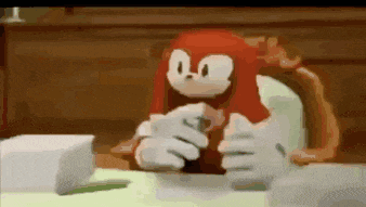 a cartoon character is sitting at a table eating a piece of bread .